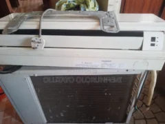 NEATLY USED 1.5 HORSEPOWER AIR CONDITIONER FOR SALE